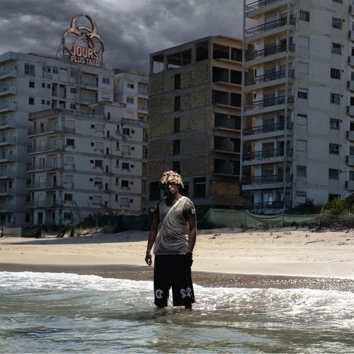 LOCKED UP (feat. Tiakola)